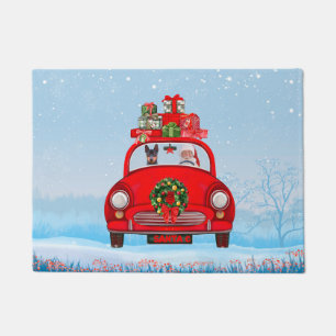 Miniature Pinscher Dog In Car With Santa Claus Doormat