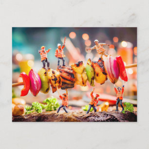 miniature workers carrying shashlik skewer holiday postcard