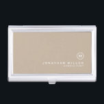 Minimal Beige Classic Monogram Business Card Holder<br><div class="desc">Minimalist monogram design with classic block monogram medallion in a classic font with personalized name and title below on a simple beige background. Personalize for your custom use.</div>