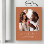 Minimal Boho Photo Arch Terracotta Save the Date Magnetic Invitation<br><div class="desc">This simple,  minimalist boho Save the Date magnetic card features an arch-shaped photo above the words "Save the Date" in elegant white handwriting script,  followed by the couple's names,  wedding date and city in sans serif font on a terracotta background.</div>
