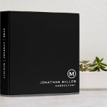 Minimal Classic Black White Monogram Binder<br><div class="desc">Professional monogrammed binder features a modern minimalist design in black and white. Custom name presented in the lower right-hand corner in stylish simple font with a complimentary minimal monogram medallion. A modern binder for home or office, a professional monogrammed binder for your workspace. Ideal for consultants, attorneys, real estate agents,...</div>