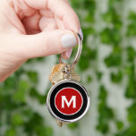 Minimal Classic Monogram Black Red Keychain<br><div class="desc">Minimal monogrammed round keychain features a black background with your monogram initial in red emblem in white classic block typography for a simple classic professional look.</div>
