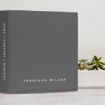 Minimal Grey Monogram Name Binder<br><div class="desc">Modern professional binder features a minimal design in a grey and white colour palette. Custom name presented in the lower third in stylish simple font and custom name, company or subject on the spine. Shown with a custom name on the front in simple traditional typography, this personalized business binder is...</div>