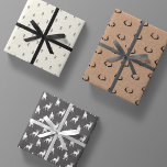 Minimal Masculine Kraft Black White Grey Christmas Wrapping Paper Sheet<br><div class="desc">the ultimate gentleman's christmas gift wrapping paper pack. includes 3 sheets with three different designs. 1.) rustic brown organic kraft paper print with black deer antlers,  2.) antique ivory with black minimalist simple stick figure xmas trees 3.) charcoal grey with white reindeer silhouettes.</div>