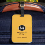 Minimal Mustard Yellow Modern Typographic Monogram Luggage Tag<br><div class="desc">A minimalist vertical design in an elegant style with a black and white monogram emblem with large typographic initial monogram on a trendy mustard yellow background. The text can easily be customized using the fields provided.</div>