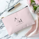 Minimal Pastel Pink Initial & Personalized  Accessory Pouch<br><div class="desc">Travel in style with this Minimal Pastel Pink Initial & Personalized Duffle Bag. Featuring a sleek and minimalist design, this duffle bag is perfect for weekend getaways, gym sessions, or daily commutes. The soft pastel pink background adds a touch of elegance and femininity, while the personalized initial or name makes...</div>