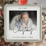 Minimal Photo Baby's First Christmas Grey Script Metal Ornament<br><div class="desc">Celebrate baby's first Christmas with this modern minimalist photo keepsake ornament. The charcoal grey text reads "My first Christmas, " with the word "Christmas" in trendy handwriting script. Easily replace the sample image with your favourite photo, and add baby's name and the year below. A white gradient screen helps make...</div>