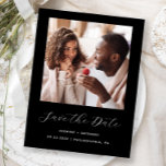 Minimal Photo Black Save the Date Announcement Postcard<br><div class="desc">This simple, minimalist Save the Date postcard features a square photo above the words "Save the Date" in elegant white handwriting script, followed by the couple's names, wedding date and city in sans serif font on a black background. Add a more detailed message with additional information on the reverse, along...</div>
