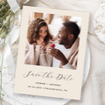 Minimal Photo Script Beige Save the Date Announcement Postcard<br><div class="desc">This simple, minimalist Save the Date postcard features a square photo above the words "Save the Date" in elegant white handwriting script, followed by the couple's names, wedding date and city in sans serif font on a beige background. Add a more detailed message with additional information on the reverse, along...</div>