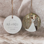 Minimal SilverNewlywed 1st Christmas Wedding Photo Ceramic Ornament<br><div class="desc">This minimal silver newlywed first Christmas wedding photo ceramic ornament is the perfect simple Christmas tree decoration. The design features classic black and white typography paired with a rustic yet elegant script font with hand lettered style. This keepsake ornament reads "our first Christmas as mr and mrs". Personalize the front...</div>