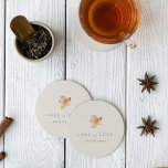 Minimalist Autumn Leaf "Fall in Love" Personalized Round Paper Coaster<br><div class="desc">Fall in love with this modern and minimal design for autumn weddings, engagement parties, or rehearsal dinners. Clean, minimalist design features a soft off-white background graced with a single watercolor leaf in warm fall colours. "Fall in love" appears beneath, along with the couple's names or your choice of personalization in...</div>