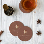 Minimalist Autumn Leaf "Fall in Love" Personalized Round Paper Coaster<br><div class="desc">Fall in love with this modern and minimal design for autumn weddings, engagement parties, or rehearsal dinners. Clean, minimalist design features a terracotta rust background graced with a single watercolor leaf in warm fall colours. "Fall in love" appears beneath, along with the couple's names or your choice of personalization in...</div>