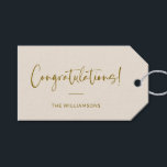 Minimalist Beige Personalized Congratulations Gift Tags<br><div class="desc">A sophisticated and timeless gift tag featuring a soft cream background with elegant script and modern typography in warm gold. Perfect for adding a personalized touch to wedding gifts,  baby showers,  graduations,  or any celebratory occasion. Customize with your family name or message for a stylish and thoughtful finishing touch.</div>