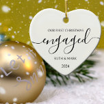 Minimalist Black and White First Christmas Engaged Ceramic Ornament<br><div class="desc">This "First Christmas Engaged" ornament features custom names and year.</div>