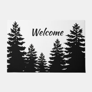Minimalist black and white pine tree silhouette    doormat