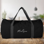 Minimalist Black Modern Script Monogram Duffle Bag<br><div class="desc">Minimalist Black Modern Script Monogram Duffle Bag</div>