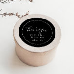Minimalist | Black Thank You Wedding Favour Sticke Classic Round Sticker<br><div class="desc">These minimalist black thank you wedding favour stickers are perfect for a simple wedding reception. The modern romantic design features classic black and white typography paired with a rustic yet elegant calligraphy with vintage hand lettered style. Customizable in any colour. Keep the design simple and elegant, as is, or personalize...</div>