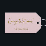 Minimalist Blush Pink Personalized Congratulations Gift Tags<br><div class="desc">A stylish and elegant gift tag featuring a soft blush pink background with flowing script and modern typography in warm gold. Perfect for adding a personal touch to wedding gifts, baby showers, graduations, or any celebratory occasion. Customize with your family name or message for a unique and thoughtful finishing touch....</div>