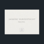 Minimalist Coastal Wedding  Place Card<br><div class="desc">Guide guests to their tables with calm, coastal elegance. These minimalist wedding escort cards feature refined serif typography on a warm ivory background, pairing guest names with table assignments in a clean, editorial layout. A whisper-soft sand dollar accent at the bottom adds a subtle seaside touch while keeping the focus...</div>