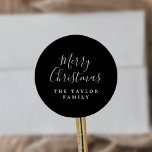 Minimalist Dark Black Merry Christmas Holiday Gift Classic Round Sticker<br><div class="desc">These minimalist dark black Merry Christmas holiday gift stickers are perfect for a simple holiday present or holiday card. The design features classic black and white typography paired with a rustic yet elegant script font with hand lettered style. Personalize the stickers with your name.</div>
