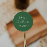 Minimalist Dark Green Merry Christmas Holiday Gift Classic Round Sticker<br><div class="desc">These minimalist dark green Merry Christmas holiday gift stickers are perfect for a simple holiday present or holiday card. The design features classic green and white typography paired with a rustic yet elegant script font with hand lettered style. Personalize the stickers with your name.</div>