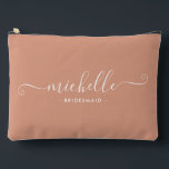 Minimalist Desert Coral Personalized Bridesmaid Accessory Pouch<br><div class="desc">Introducing our Chic Minimalist wine berry Personalized Bridesmaid Accessory Pouch, a stylish and versatile gift designed to celebrate your bridesmaids in elegance. This accessory pouch is the epitome of modern chic, perfect for any occasion from bridesmaid proposals to bridal showers. Crafted with a minimalist design, this pouch features a coral...</div>