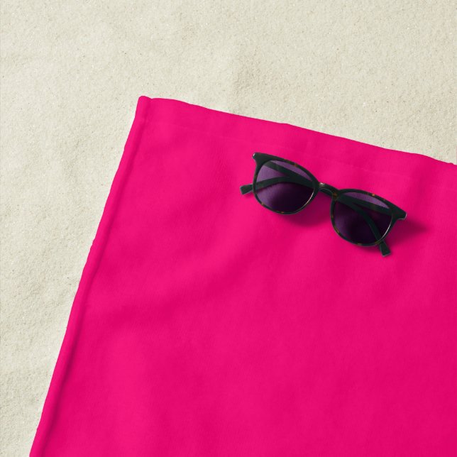 Minimalist fuchsia hot pink plain solid modern beach towel (In Situ)
