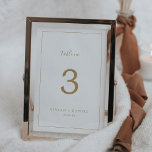 Minimalist Gold Table Number<br><div class="desc">This minimalist gold table number is perfect for a simple wedding. The modern romantic design features classic gold and white typography paired with a rustic yet elegant calligraphy with vintage hand lettered style. Customizable in any colour. Keep the design simple and elegant, as is, or personalize it by adding your...</div>