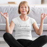 Minimalist Grandma EST 2025 Custom Gift T-Shirt<br><div class="desc">Celebrate a beautiful new role with this Minimalist Grandma EST 2025 custom T-shirt — the perfect gift for soon-to-be or first-time grandmothers. Featuring sleek, elegant typography on a soft, comfortable tee, this design is ideal for baby announcements, Mother’s Day, pregnancy reveals, or everyday wear. Add the personalized year to mark...</div>