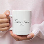 Minimalist Grandma EST 2025 | Personalized Gift Coffee Mug<br><div class="desc">Celebrate a special milestone with this Minimalist Grandma EST 2025 personalized mug — a perfect gift for a first-time grandma! Designed with elegant modern typography on a crisp white background, this mug is both meaningful and stylish. Customize the year to mark her new chapter and give her a daily reminder...</div>