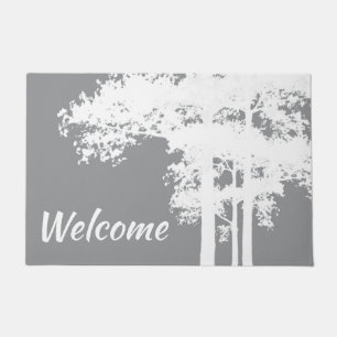 Minimalist grey and white tree silhouettes     doormat
