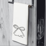 Minimalist Hand Drawn Bow Name Kitchen Towel<br><div class="desc">Simple Name Monogram Minimalist Kitchen Towel. Add a stylish and functional touch to your kitchen with this adorable tri-fold towel, perfect for everyday use or special occasions. The design features a single hand-drawn bow centred at the bottom when folded, with a personalized name in sweet handwritten script calligraphy beneath it....</div>