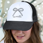 Minimalist Hand Drawn Bow Name Trucker Hat<br><div class="desc">Simple Name Monogram Minimalist Trucker Hat. This trendy and stylish trucker hat features a single hand-drawn bow at the top, paired with a name in elegant handwritten script calligraphy below. Both the bow and the name are currently black but can be customized to any colour, making it a versatile accessory...</div>