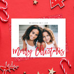 Minimalist Modern Red Script Merry Christmas Photo Holiday Card<br><div class="desc">This modern yet elegant holiday photo card features a single horizontal photo over a classic white background with a greeting in red script which says "Merry Christmas". The back of the card is a coordinating red colour, but can be customized if desired. You can also add another photo to the...</div>