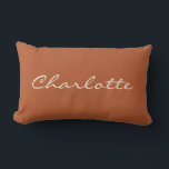 Minimalist Modern Script in Rust Personalized    Lumbar Pillow<br><div class="desc">This custom throw pillow features your name in beautiful handwritten script lettering on a stylish earthy rust background. Great gift idea.</div>