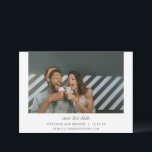 Minimalist Modern Typography Couple Two Photo Save The Date<br><div class="desc">Announce your big day with this minimalist modern save-the-date card, featuring a sleek white background and space for two photos—one on the front and one on the back. The clean typography adds a contemporary touch, perfectly complementing the timeless simplicity of the design. Showcase your favourite moments as a couple while...</div>