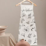 Minimalist modern white black floral Personalized Apron<br><div class="desc">Does she love clean lines and contemporary design? Give her a personalized apron to match her beautiful kitchen with this Black and White Floral Apron. Featuring custom-illustrated line art flowers for a streamlined and elegant look, this apron pairs perfectly with a modern script font featuring long-tailed embellishments. A thoughtful gift...</div>
