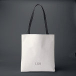 Minimalist Monogram Bridesmaid Tote Bag<br><div class="desc">A gift they’ll carry everywhere—literally. This ivory tote bag with a clean grey monogram is roomy enough for wedding-day essentials and chic enough for everyday errands. A personalized bridesmaid gift that’s as practical as it is beautiful.</div>