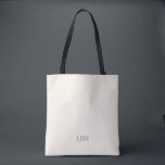 Minimalist Monogram Bridesmaid Tote Bag<br><div class="desc">A gift they’ll carry everywhere—literally. This ivory tote bag with a clean grey monogram is roomy enough for wedding-day essentials and chic enough for everyday errands. A personalized bridesmaid gift that’s as practical as it is beautiful.</div>