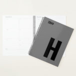 Minimalist Monogram Initial Grey Black Planner<br><div class="desc">Masculine Planner, with your choice of initial and editable year. This minimalist design features oversized sans serif typography in black on a grey background. The template is set up for you to change the letter and edit the year. If you wish to edit the colours as well, please click "customize...</div>