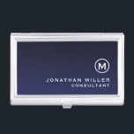 Minimalist Monogram Navy Blue Business Card Holder<br><div class="desc">Elevate your networking game with this minimalist business card case featuring a monogram medallion, name and title or custom text of your choice. The sleek and sophisticated design makes a statement of elegance and professionalism. The case is perfect for holding your business cards, credit cards, or IDs. It's compact and...</div>