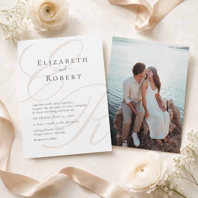 Minimalist Monogram Photo Wedding Invitation (Minimalist Monogram Photo Wedding Invitation on a table with white flowers and beige silk ribbon)
