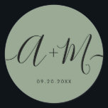 Minimalist Monogram Script Custom green Wedding Classic Round Sticker<br><div class="desc">Elevate your wedding details with the Minimalist Monogram Script Custom Wedding Date green Sticker. This elegant and personalized sticker adds a touch of sophistication to your wedding stationery, allowing you to showcase your monogram and wedding date in a simple yet impactful way. The sticker features a minimalist script design that...</div>