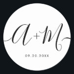 Minimalist Monogram Script Custom Wedding date Classic Round Sticker<br><div class="desc">Elevate your wedding details with the Minimalist Monogram Script Custom Wedding Date Sticker. This elegant and personalized sticker adds a touch of sophistication to your wedding stationery, allowing you to showcase your monogram and wedding date in a simple yet impactful way. The sticker features a minimalist script design that exudes...</div>
