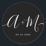 Minimalist Monogram Script Custom Wedding date Classic Round Sticker<br><div class="desc">Elevate your wedding details with the Minimalist Monogram Script Custom Wedding Date Sticker white text on black. This elegant and personalized sticker adds a touch of sophistication to your wedding stationery, allowing you to showcase your monogram and wedding date in a simple yet impactful way. The sticker features a minimalist...</div>