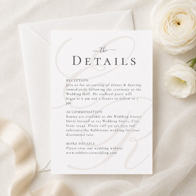 Minimalist Monogram Wedding Details Card (Minimalist Monogram Wedding Details Card on a table with white flowers)