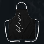 Minimalist Motivational Believe Script Black Apron<br><div class="desc">Minimalist Motivational Believe Modern Script Black. An inspiring single word Believe for the cook in classic black and white.</div>