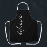 Minimalist Motivational Believe Script Black Apron<br><div class="desc">Minimalist Motivational Believe Modern Script Black. An inspiring single word Believe for the cook in classic black and white.</div>