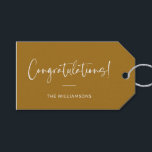 Minimalist Mustard Yellow Custom Congratulations Gift Tags<br><div class="desc">A sophisticated and timeless gift tag featuring an mustard yellow background with elegant script and modern typography in white. Perfect for adding a personalized touch to wedding gifts,  baby showers,  graduations,  or any celebratory occasion. Customize with your family name or message for a stylish and thoughtful finishing touch.</div>