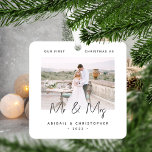 Minimalist Photo First Christmas as Mr & Mrs Gray Metal Ornament<br><div class="desc">Celebrate your first Christmas as a married couple with this modern minimalist photo keepsake ornament. The charcoal gray text reads "Our first Christmas as Mr & Mrs, " with the words "Mr & Mrs" in trendy handwriting script. Easily replace the sample image with your favorite photo, and add your names...</div>